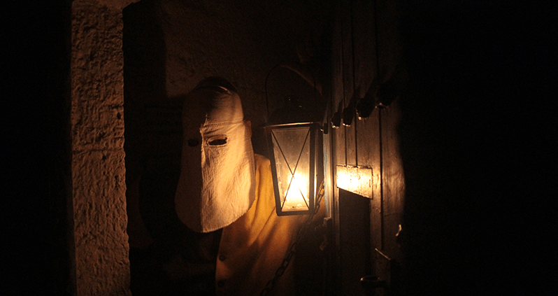 Prisoner with lantern